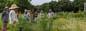 Kansas Permaculture Institute educational workshop group on a field tour